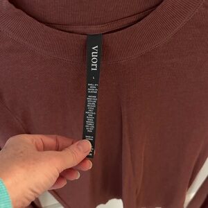 Vuori Women's Long Sleeve Top in Rich Marv/burgundy color